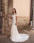 Glamorous Mermaid Wedding Gown with an Off-Shoulder Neckline and a Flattering Natural Waistline for a Breathtaking Bridal Look