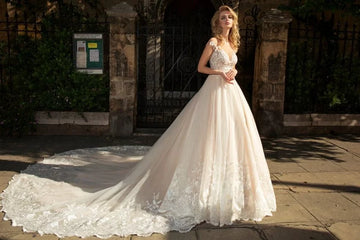 Opulent Ball Gown Wedding Dress with Strapless V-Neckline, Sparkling Beaded Lace Detailing, and a Flattering Dropped Waist for a Breathtaking Bridal Look