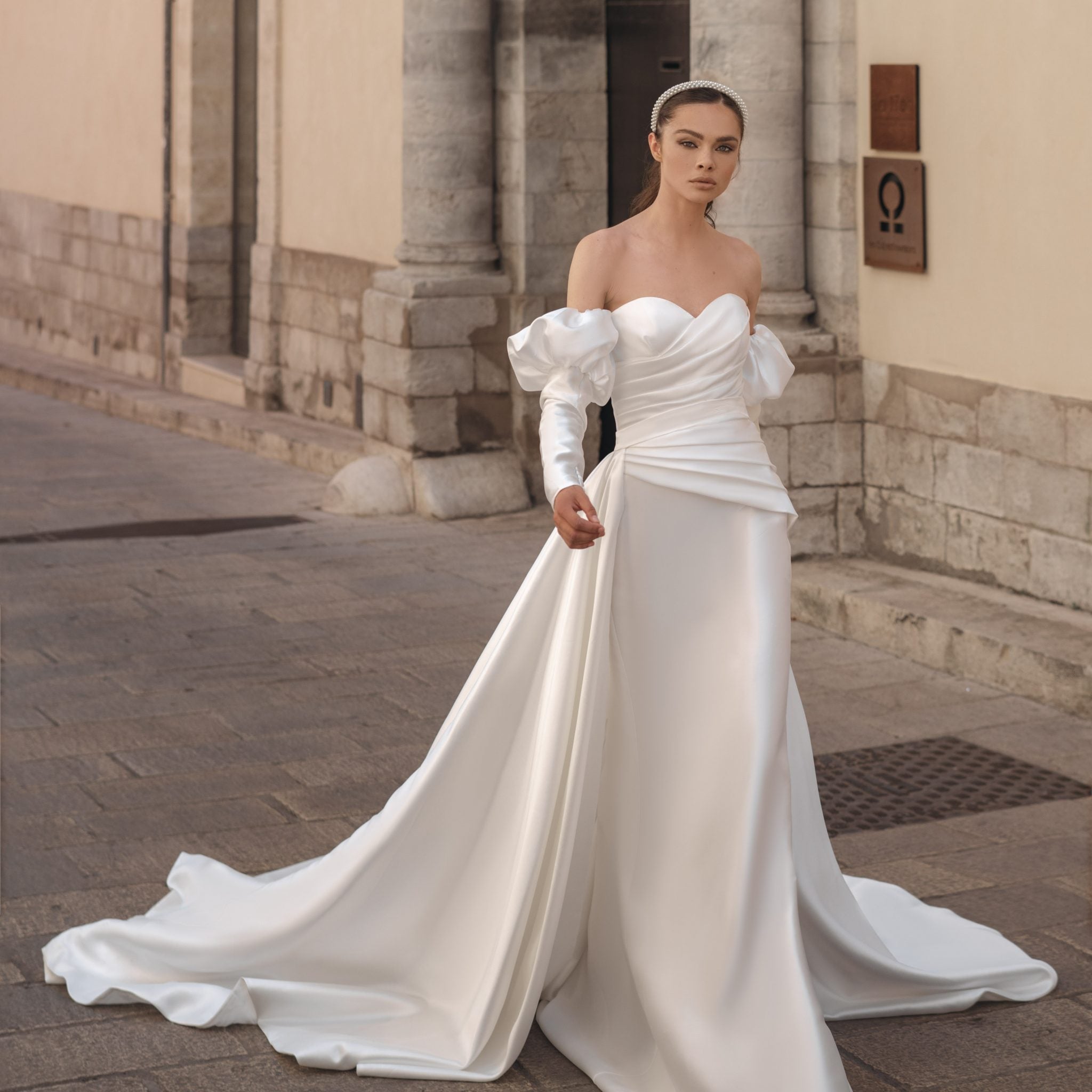 Elegant Sheath Wedding Gown, Long Sleeves, and a Queen Anne Neckline for a Regal and Sophisticated Bridal Look