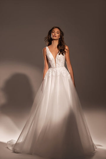 Graceful A-Line Wedding Dress with V-Neckline, Sleeveless Design, and Lace Embellishments