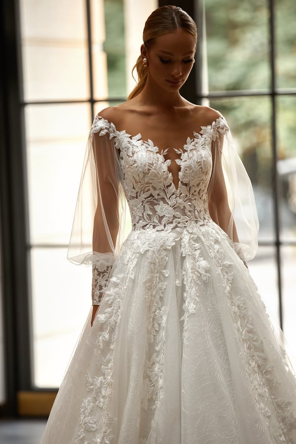 Stunning A-Line Wedding Dress with Puff Sleeves, Deep Neckline, 3D Application Embellishments, and a Natural Waistline for a Truly Elegant Bridal Look