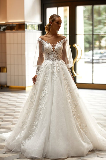 Stunning A-Line Wedding Dress with Puff Sleeves, Deep Neckline, 3D Application Embellishments, and a Natural Waistline for a Truly Elegant Bridal Look