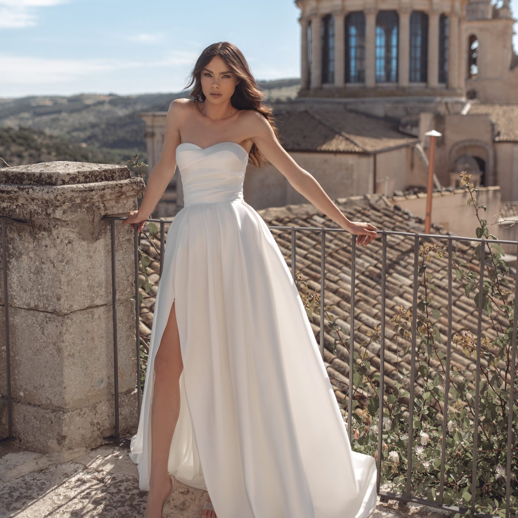 Elegant A-Line Wedding Gown with a Strapless Sweetheart Neckline and a Flattering Natural Waistline for a Regal and Timeless Bridal Look