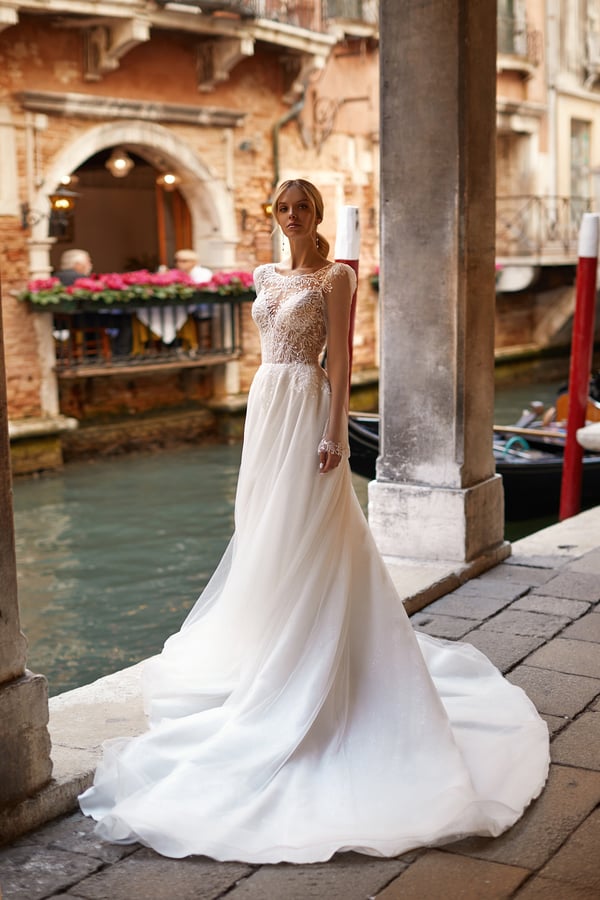 Stunning A-Line Wedding Gown with Cap Sleeves, Boat Neckline, and Elegant Embroidery, Featuring a Natural Waistline for a Timeless Bridal Look