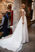 Stunning A-Line Wedding Gown with Cap Sleeves, Boat Neckline, and Elegant Embroidery, Featuring a Natural Waistline for a Timeless Bridal Look