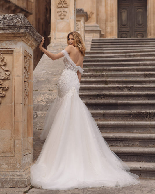 Exquisite Mermaid Wedding Gown, Off-Shoulder Neckline, and a Flattering Natural Waistline for a Glamorous and Timeless Bridal Look