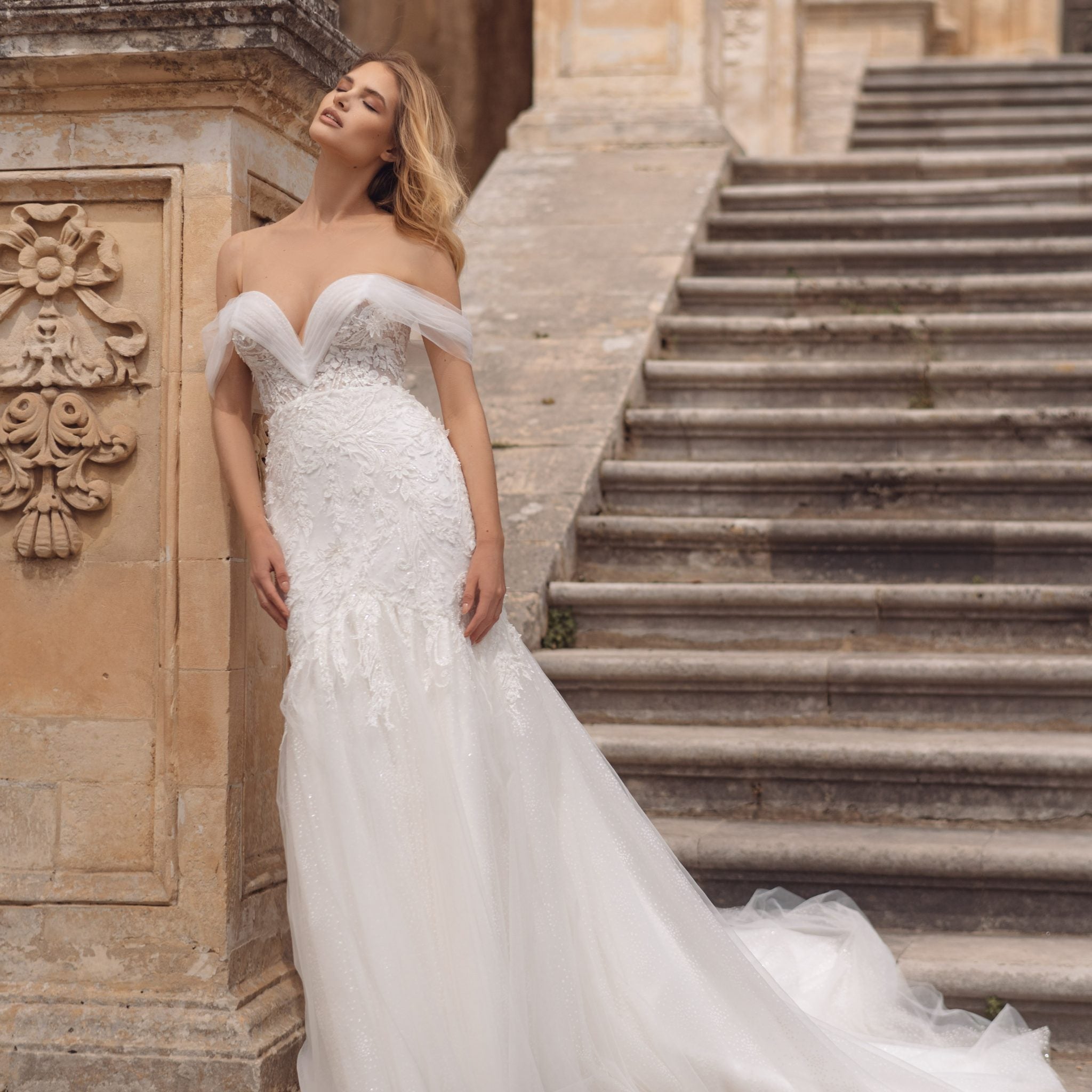 Exquisite Mermaid Wedding Gown, Off-Shoulder Neckline, and a Flattering Natural Waistline for a Glamorous and Timeless Bridal Look