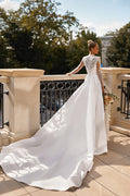 Elegant A-Line Bridal Gown with Long Sleeves, Button Embellishments, and a Natural Waistline for a Timeless Bridal Look