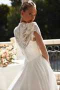 Elegant A-Line Bridal Gown with Long Sleeves, Button Embellishments, and a Natural Waistline for a Timeless Bridal Look