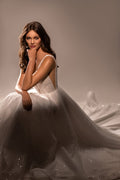 Radiant A-Line Wedding Dress with V-Neckline and Shimmering Fabric