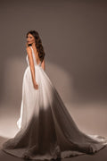 Radiant A-Line Wedding Dress with V-Neckline and Shimmering Fabric