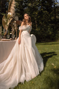 Glamorous Strapless A-Line Wedding Dress with Off-Shoulder Neckline and Glitter Detailing for a Dazzling Bridal Look