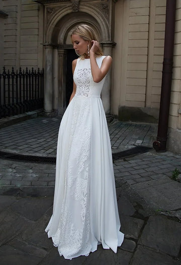 Sleek Sheath Wedding Gown with Strapless Jewel Neckline, Exquisite Lace Detailing, and a Flattering Dropped Waist for a Sophisticated and Timeless Bridal Look