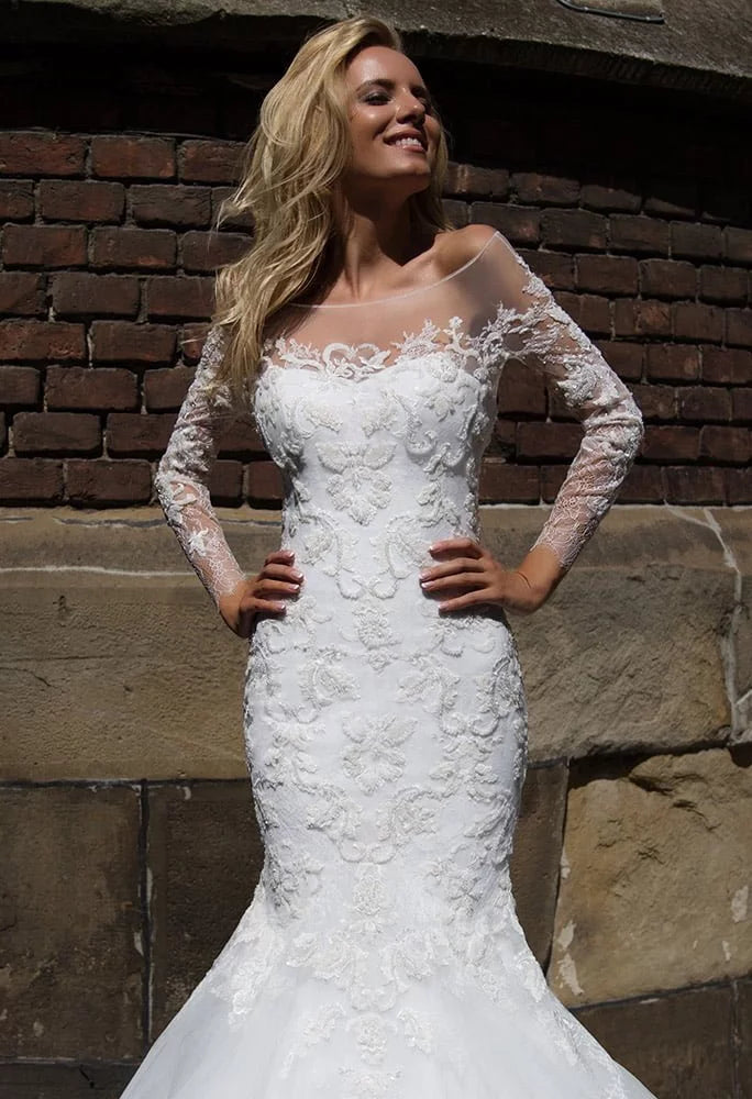 Sophisticated Mermaid Wedding Gown with Long Sleeves, Elegant Boat Neckline, and Exquisite Lace Detailing for a Timeless and Regal Bridal Look