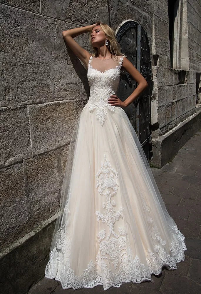 Timeless A-Line Wedding Gown with Strapless Illusion Neckline, Exquisite Lace Detailing, and a Flattering Natural Waist for a Romantic Bridal Look