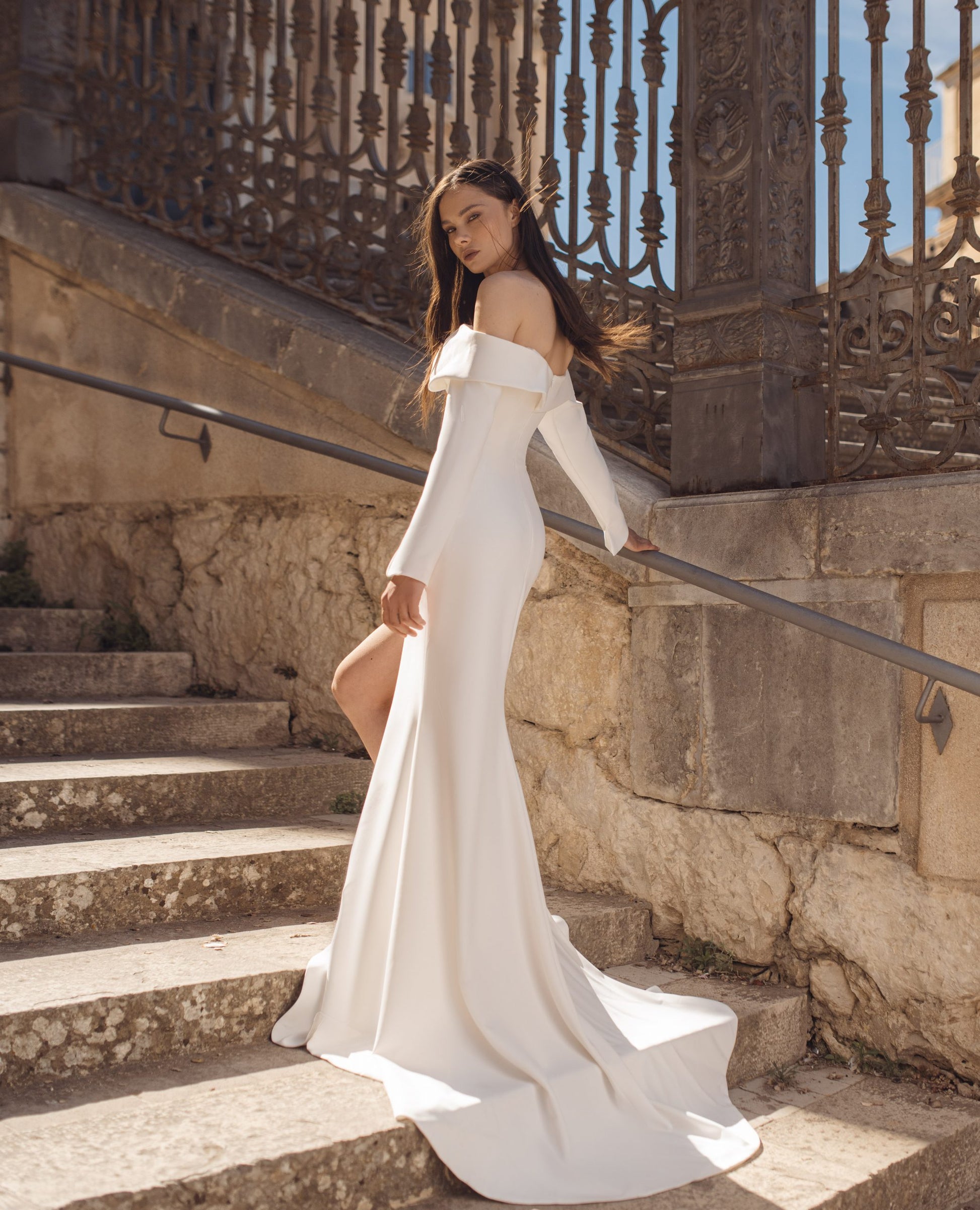 Stunning Mermaid Wedding Gown, Long Sleeves, and an Off-Shoulder Neckline for a Bold and Elegant Bridal Look