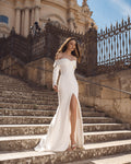 Stunning Mermaid Wedding Gown, Long Sleeves, and an Off-Shoulder Neckline for a Bold and Elegant Bridal Look