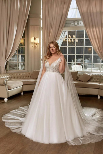 Elegant Plus Size A-Line Wedding Dress with Spaghetti Straps and V-Neckline, Featuring a Flattering Natural Waistline for a Timeless Bridal Look