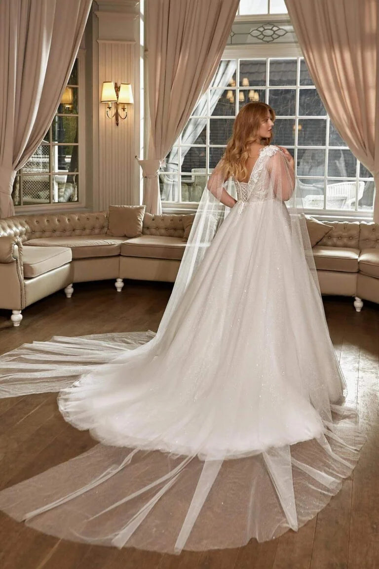 Elegant Plus Size A-Line Wedding Dress with Spaghetti Straps and V-Neckline, Featuring a Flattering Natural Waistline for a Timeless Bridal Look