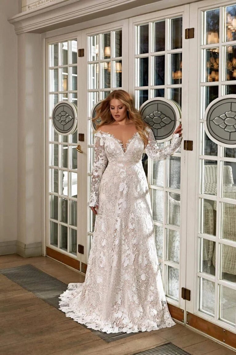 Ethereal Plus Size A-Line Wedding Gown with Long Sleeves, V-Neckline, and a Flattering Natural Waist for a Romantic and Elegant Bridal Look