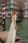 Elegant Sheath Wedding Dress with Puffy Sleeves, Deep Neckline, and Natural Waistline for a Sophisticated Bridal Look