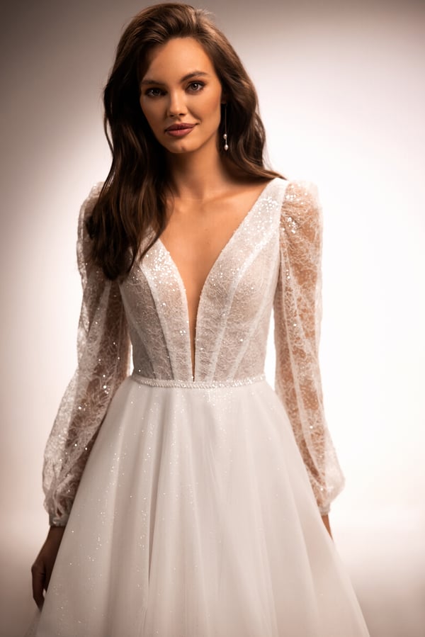 Stunning A-Line Wedding Gown with V-Neckline, Long Sleeves, and Sequin Embellishments