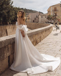 Romantic A-Line Wedding Gown, Off-Shoulder Sleeves, and a Flattering Natural Waistline for an Enchanting Bridal Look