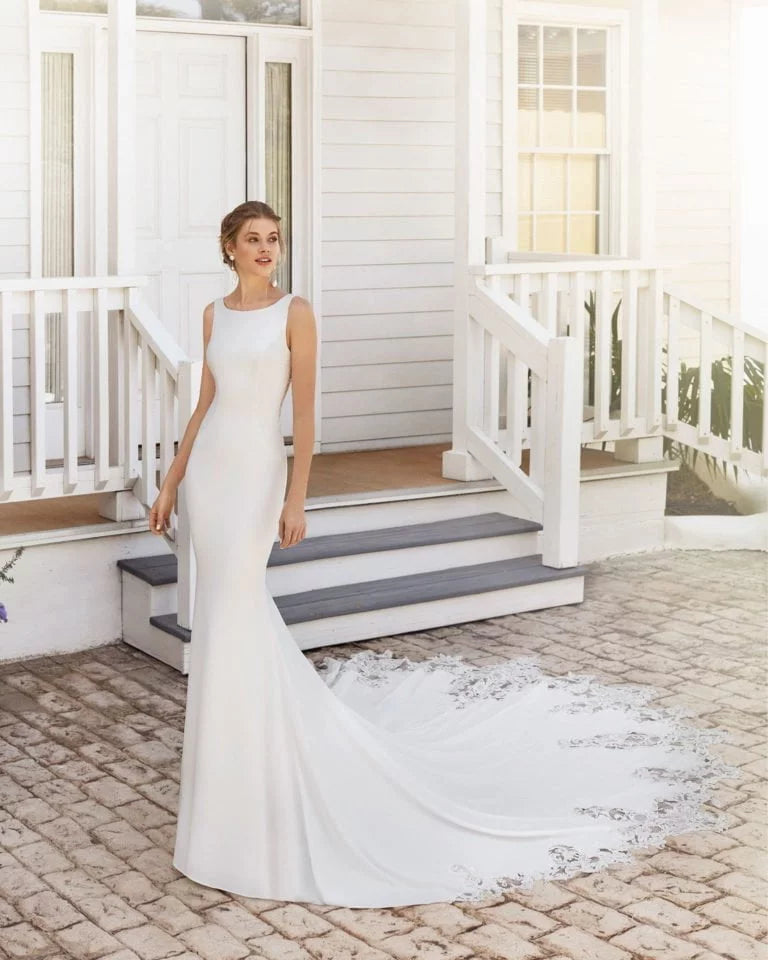 Timeless Mermaid Wedding Gown with Spaghetti Straps, Boat Neckline, and Flattering Silhouette for a Sophisticated Bridal Look