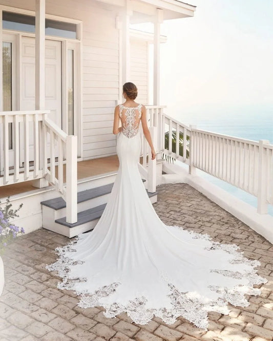 Timeless Mermaid Wedding Gown with Spaghetti Straps, Boat Neckline, and Flattering Silhouette for a Sophisticated Bridal Look