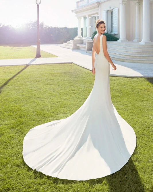 Elegant Mermaid Wedding Gown with Spaghetti Straps, Graceful V-Neckline, and a Flattering Natural Waist for a Sleek and Timeless Bridal Look