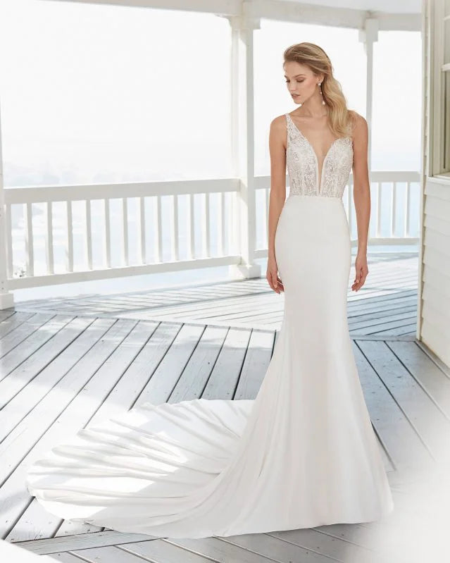 Glamorous Mermaid Wedding Gown with Spaghetti Straps, Elegant V-Neckline, and Sparkling Beaded Lace Detailing for a Captivating and Timeless Bridal Look