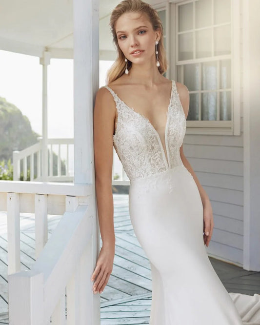 Glamorous Mermaid Wedding Gown with Spaghetti Straps, Elegant V-Neckline, and Sparkling Beaded Lace Detailing for a Captivating and Timeless Bridal Look