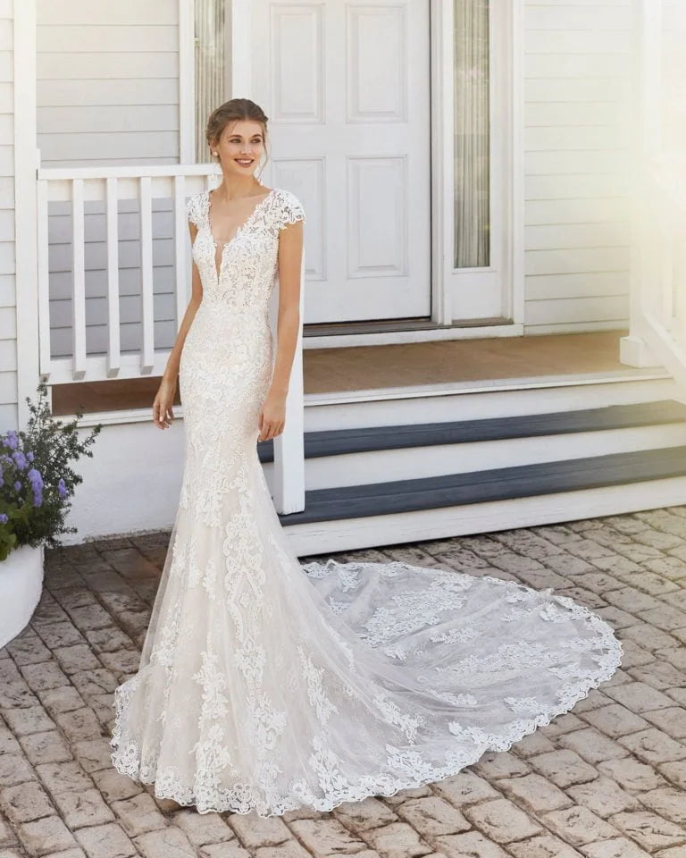 Sophisticated Mermaid Wedding Gown with Cap Sleeves, Elegant V-Neckline, and Exquisite Lace Detailing for a Timeless and Captivating Bridal Look