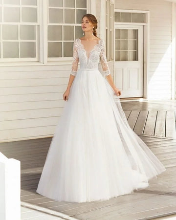 Graceful A-Line Wedding Gown with Long Sleeves, Elegant V-Neckline, and Exquisite Lace Detailing for a Timeless and Romantic Bridal Look