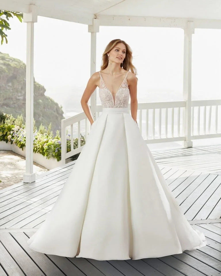 Elegant A-Line Wedding Gown with Delicate Straps, Graceful V-Neckline, Sparkling Beaded Lace Detailing, and a Flattering Dropped Waist for a Timeless and Romantic Bridal Look