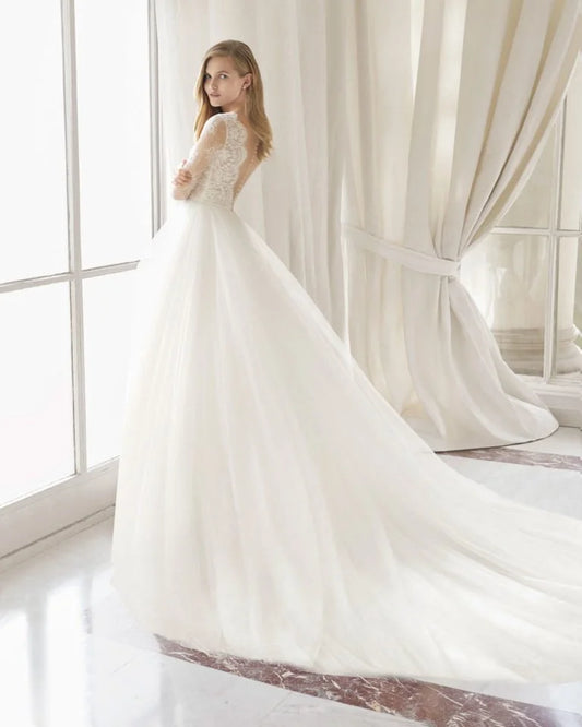 Romantic A-Line Wedding Gown with Long Sleeves, Graceful V-Neckline, and Exquisite Lace Detailing for a Timeless and Elegant Bridal Look