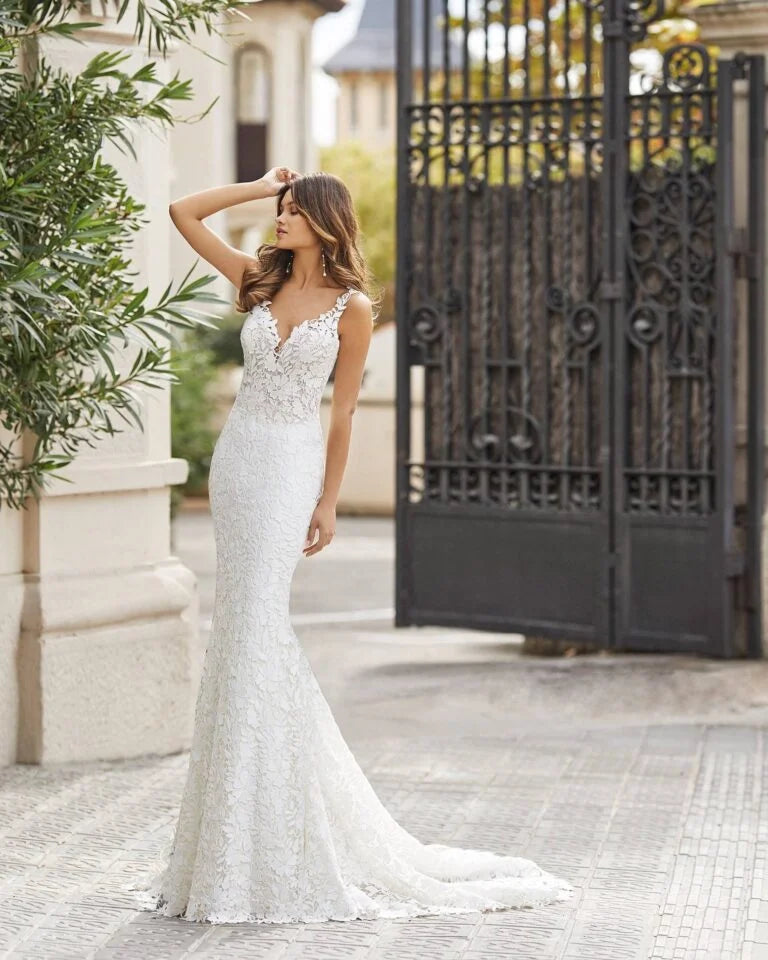 Sophisticated Mermaid Wedding Gown with Spaghetti Straps, Elegant V-Neckline, and Delicate Lace Detailing for a Chic and Timeless Bridal Look