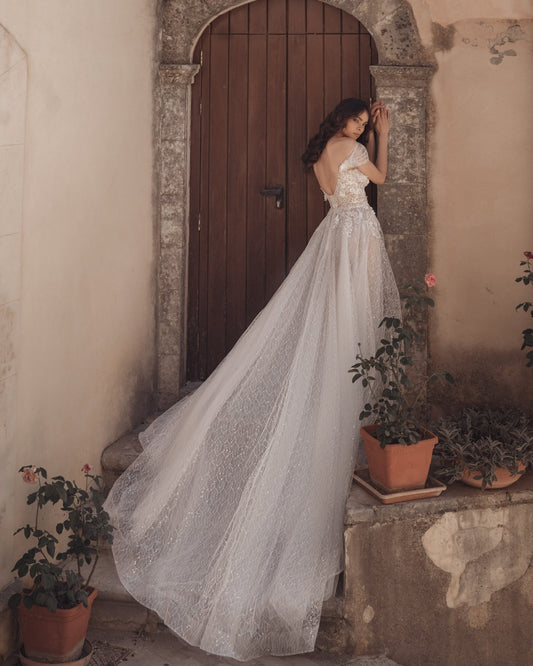 Ethereal A-Line Wedding Gown, Cap Sleeves, and a Flattering V-Neckline for a Timeless and Romantic Bridal Look