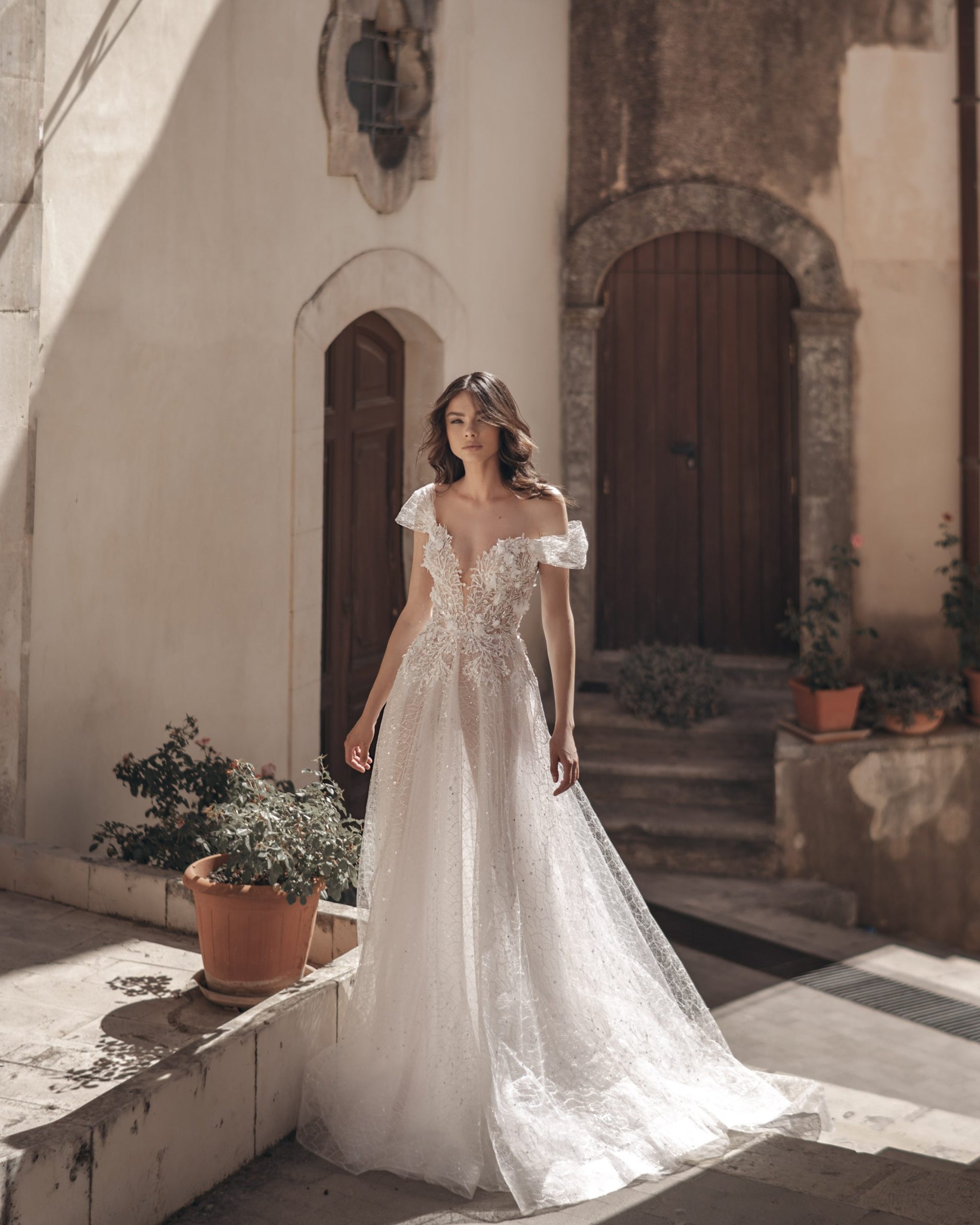 Ethereal A-Line Wedding Gown, Cap Sleeves, and a Flattering V-Neckline for a Timeless and Romantic Bridal Look