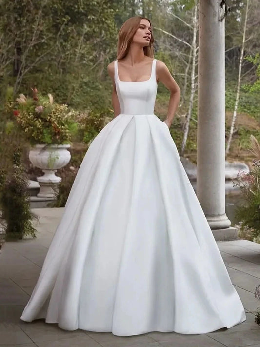 Einfache Hochzeitskleider elegantes Satin eine Linie Brautkleid mit Taschenspaghetti -Gurt Backle Messen Sie atemberaubende Brautkleider