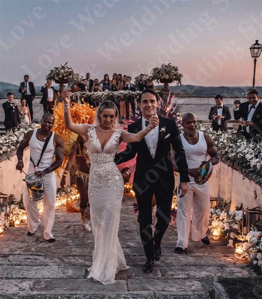 Slim Boho Mermaid Wedding Dresses Deep V-ringen Långärmar spetsar applikationer brudklänningar backless svep tågstrandrock de soiree