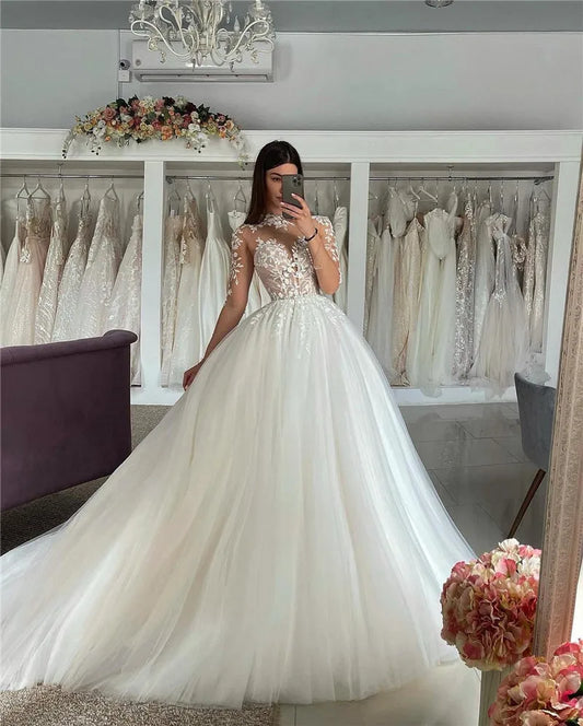 Abiti da sposa a maniche lunghe lorie un abito da sposa ad alto collo alto con abiti da sposa applicato in pizzo