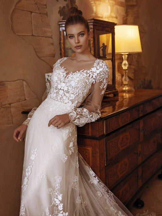 Robes de mariée de luxe magnifiques robes nuptiales appliques en dentelle à longues manches bouffantes