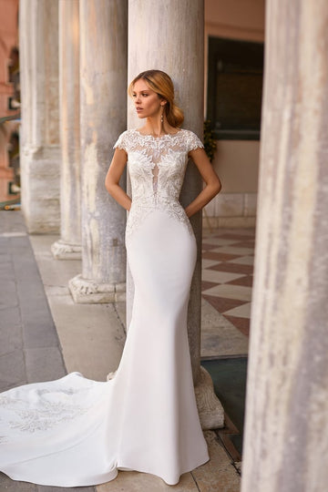 Timeless Mermaid Silhouette Wedding Dress Featuring a Graceful Boat Neckline, Delicate Cap Sleeves, and Elegant for a Sophisticated Bridal Look