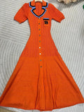 Elegant Women's Slim Fit Knitted Dress Fashionable Polo Neck Short Sleeve Single breasted Design Split Knitted Mid length Dress Short sleeved orange