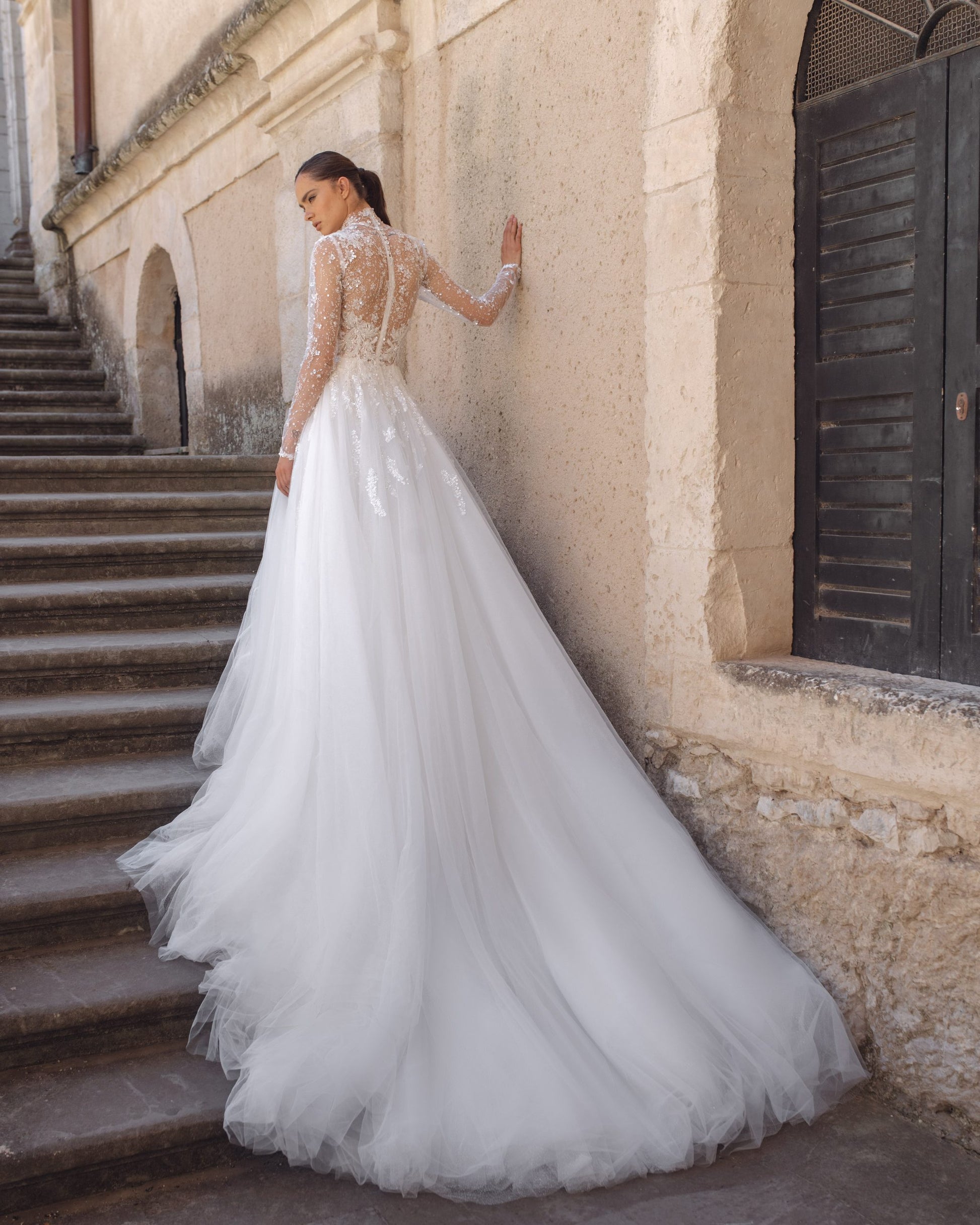 Elegant A-Line Wedding Gown with Sequin Lace, High Neckline, and Long Sleeves for a Sophisticated and Timeless Bridal Look