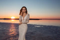 Stunning Mermaid Bridal Dress with Long Sleeves and V-Neckline, Designed with a Flattering Natural Waistline for a Sophisticated and Elegant Bridal Look