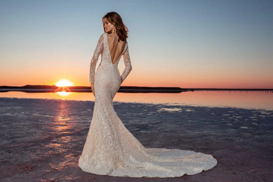 Stunning Mermaid Bridal Dress with Long Sleeves and V-Neckline, Designed with a Flattering Natural Waistline for a Sophisticated and Elegant Bridal Look