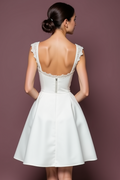 Sophisticated Short Wedding Dress and Mini Dress with a Structured Skirt
