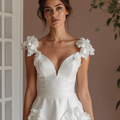 Ultra-Chic White A-Line Wedding Dress with Plunging Neckline and Sculpted Fit